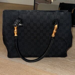 Gucci GG Canvas Small Bamboo Tote bag in black.